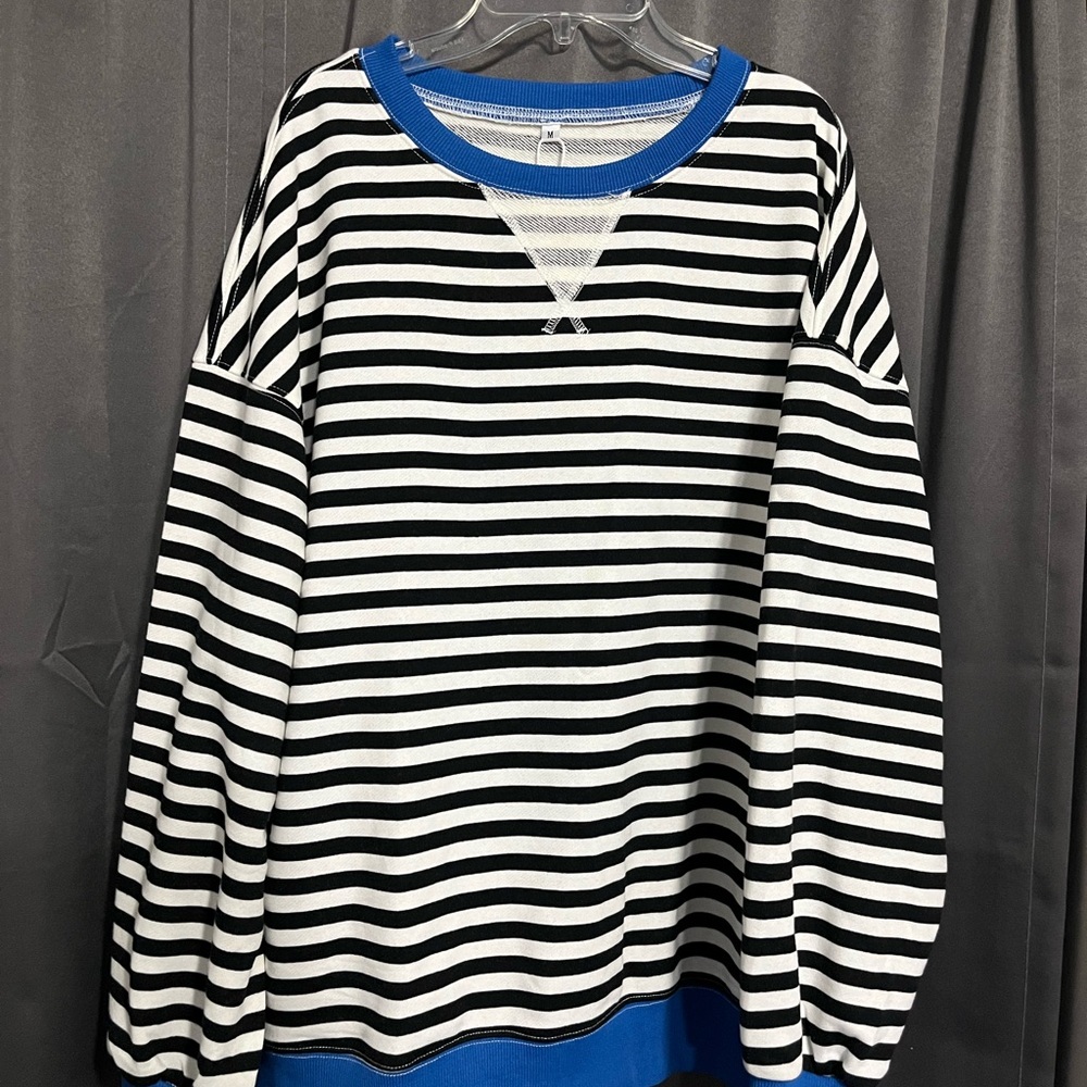 Striped Black and White Sweater with Blue Accents